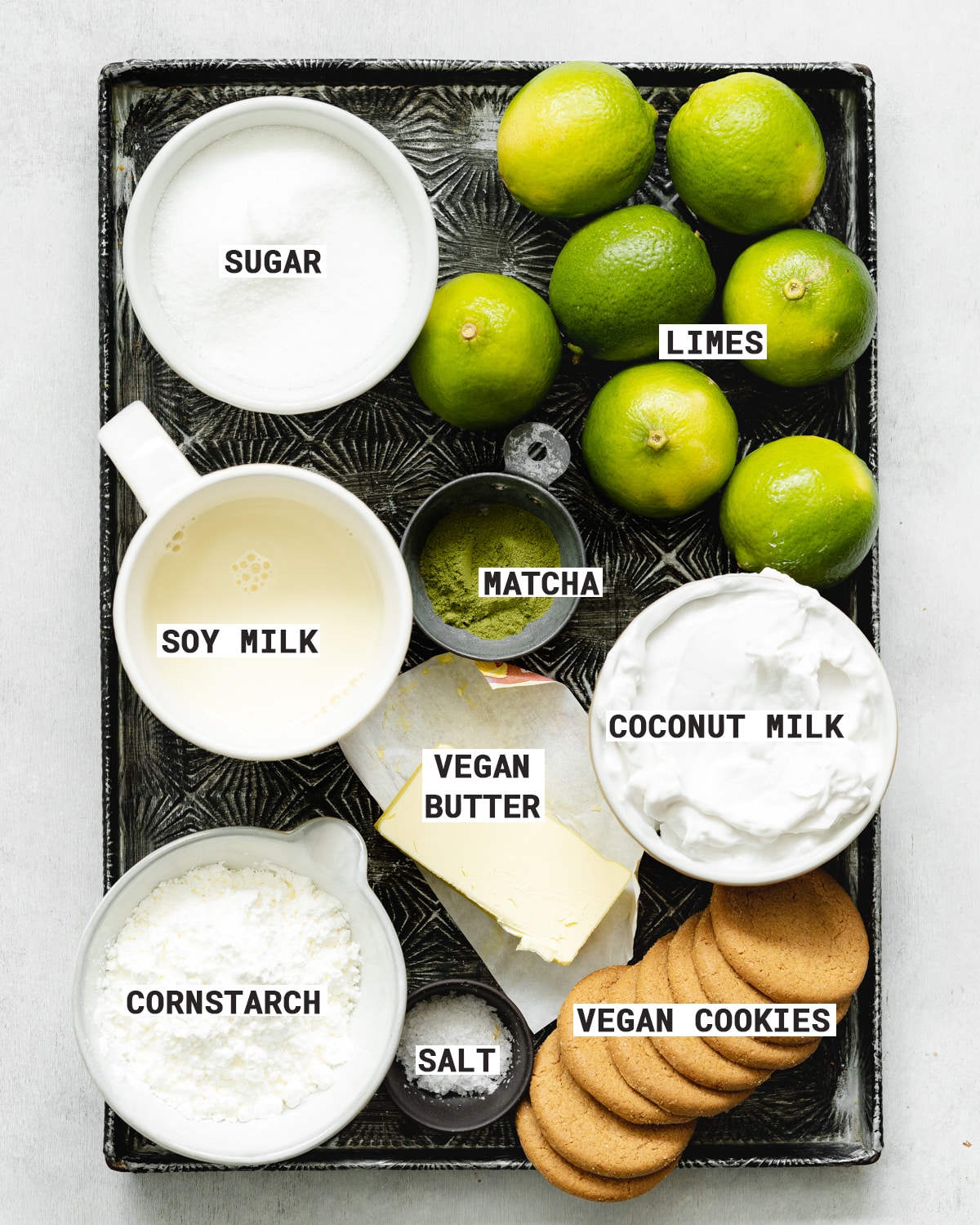 metal tray of ingredients for making vegan key lime tart.