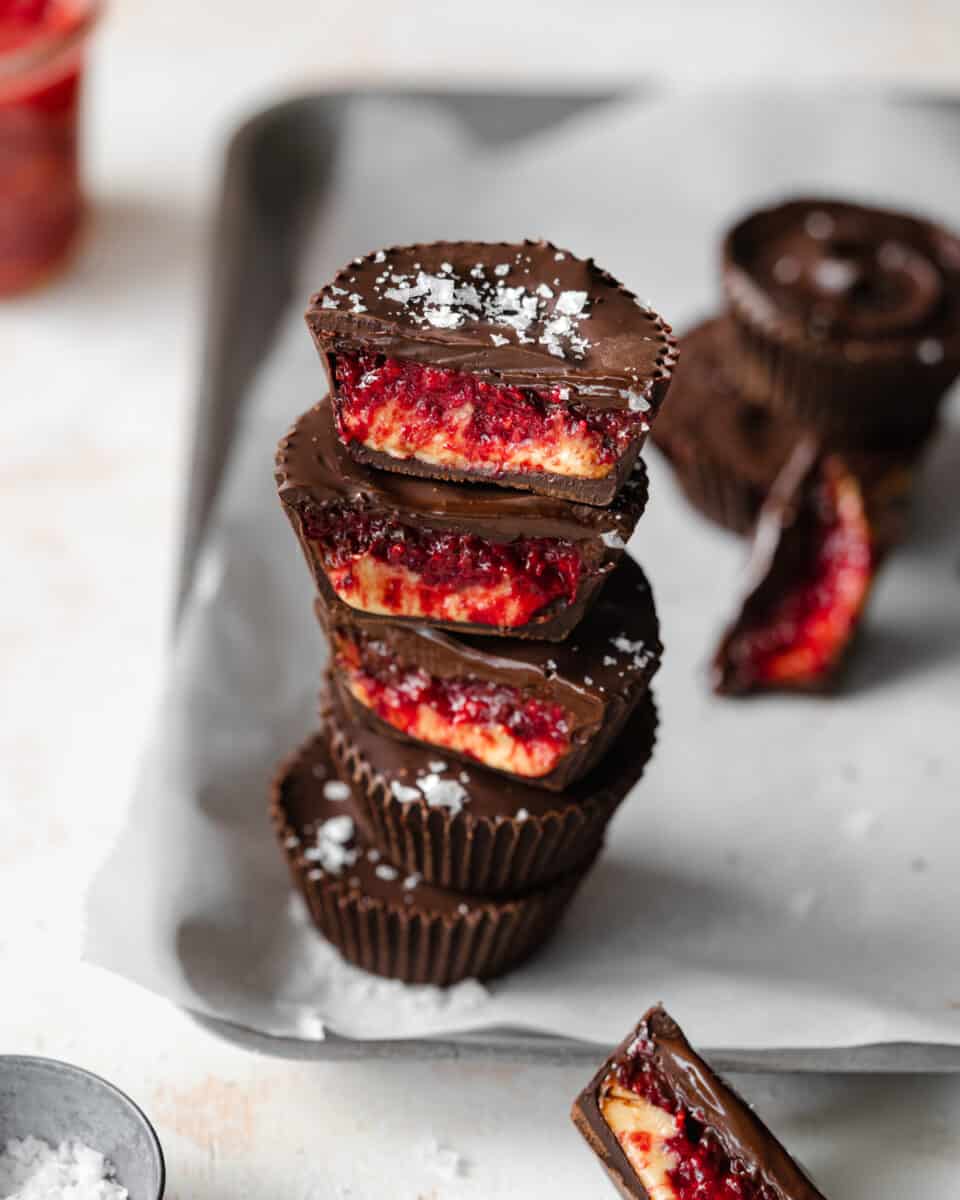 stack of peanut butter jelly filled chocolate cups.