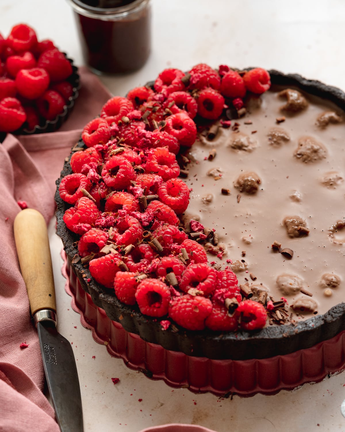 chocolate tart with fresh raspberries.