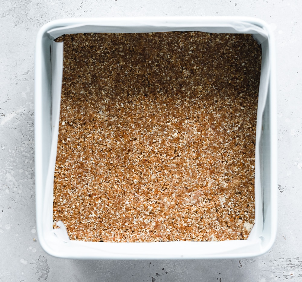 oaty crust pressed into a pan.