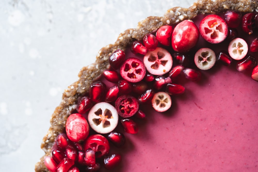 Vegan cranberry pomegranate and white chocolate tart