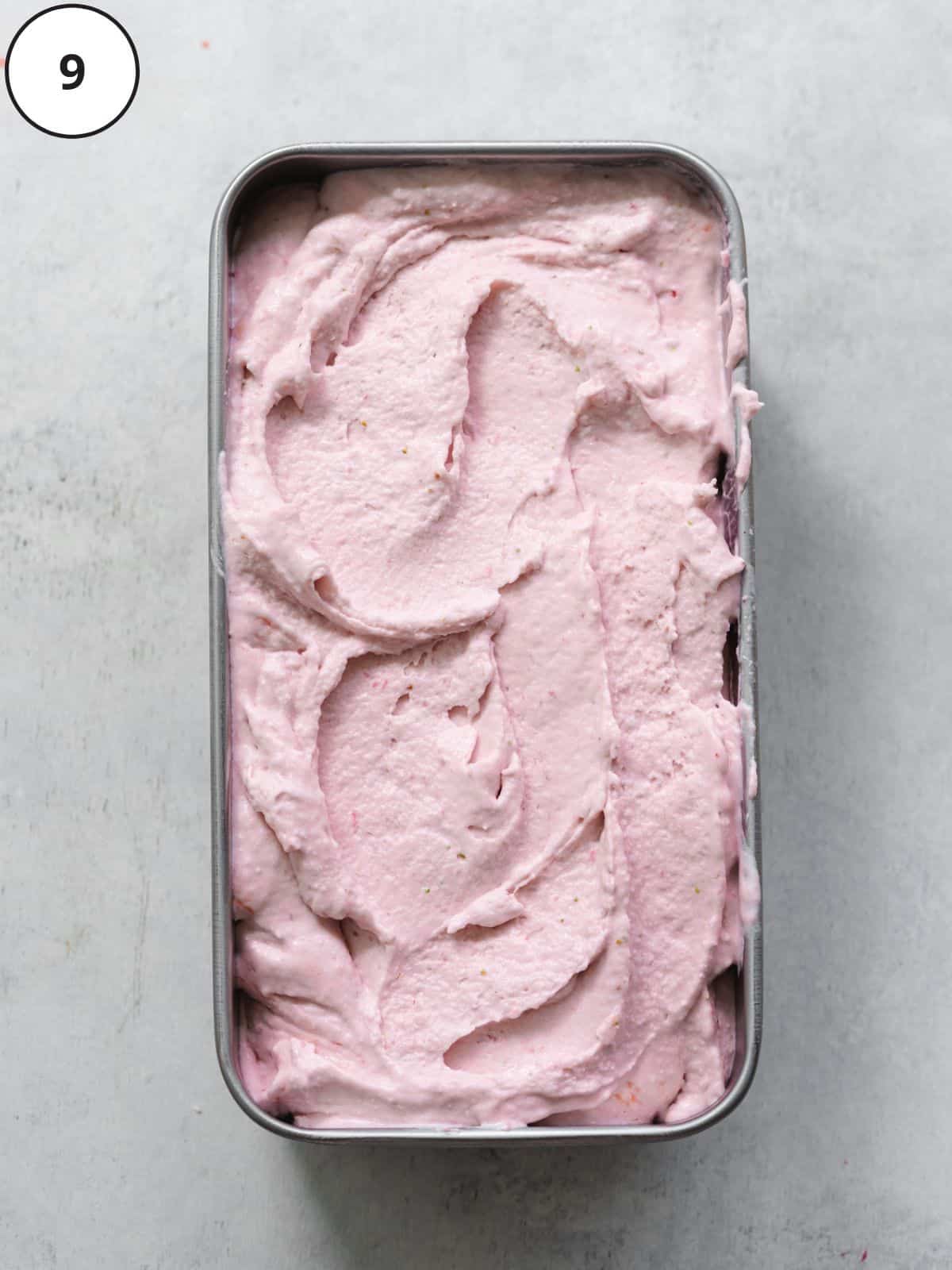 freshly made vegan strawberry ice cream in a loaf pan.