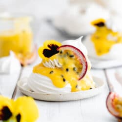 meringue nest filled with lemon passion fruit curd.