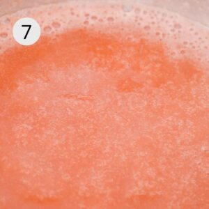 vegan gummy bear liquid bubbling and boiling inside a saucepan.