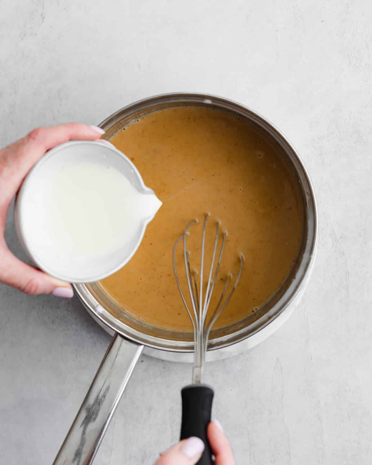 adding cornflour to thicken pumpkin custard.