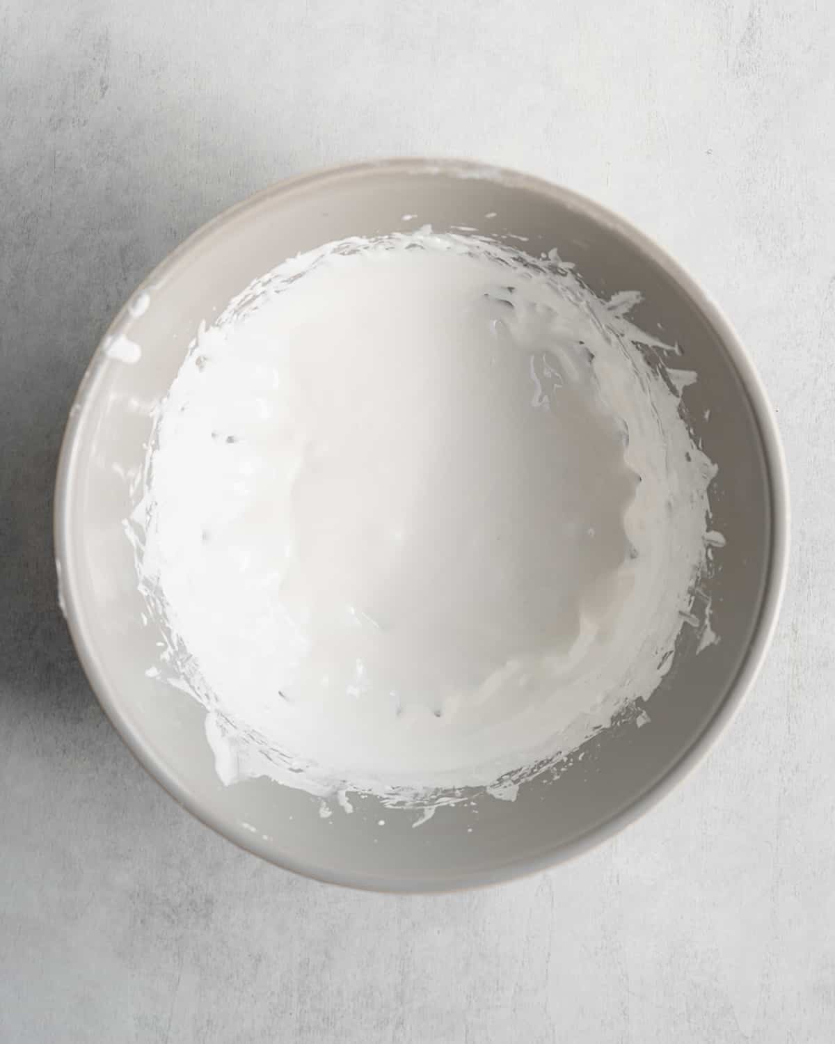 whipped aquafaba for vegan swiss buttercream recipe.