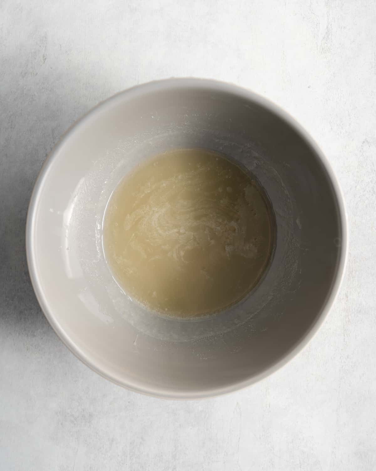 making sugar syrup for eggless swiss buttercream.