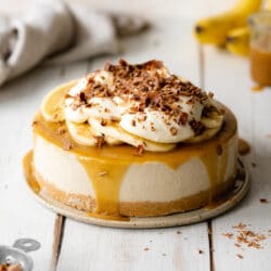vegan banana cheesecake with caramel sauce.
