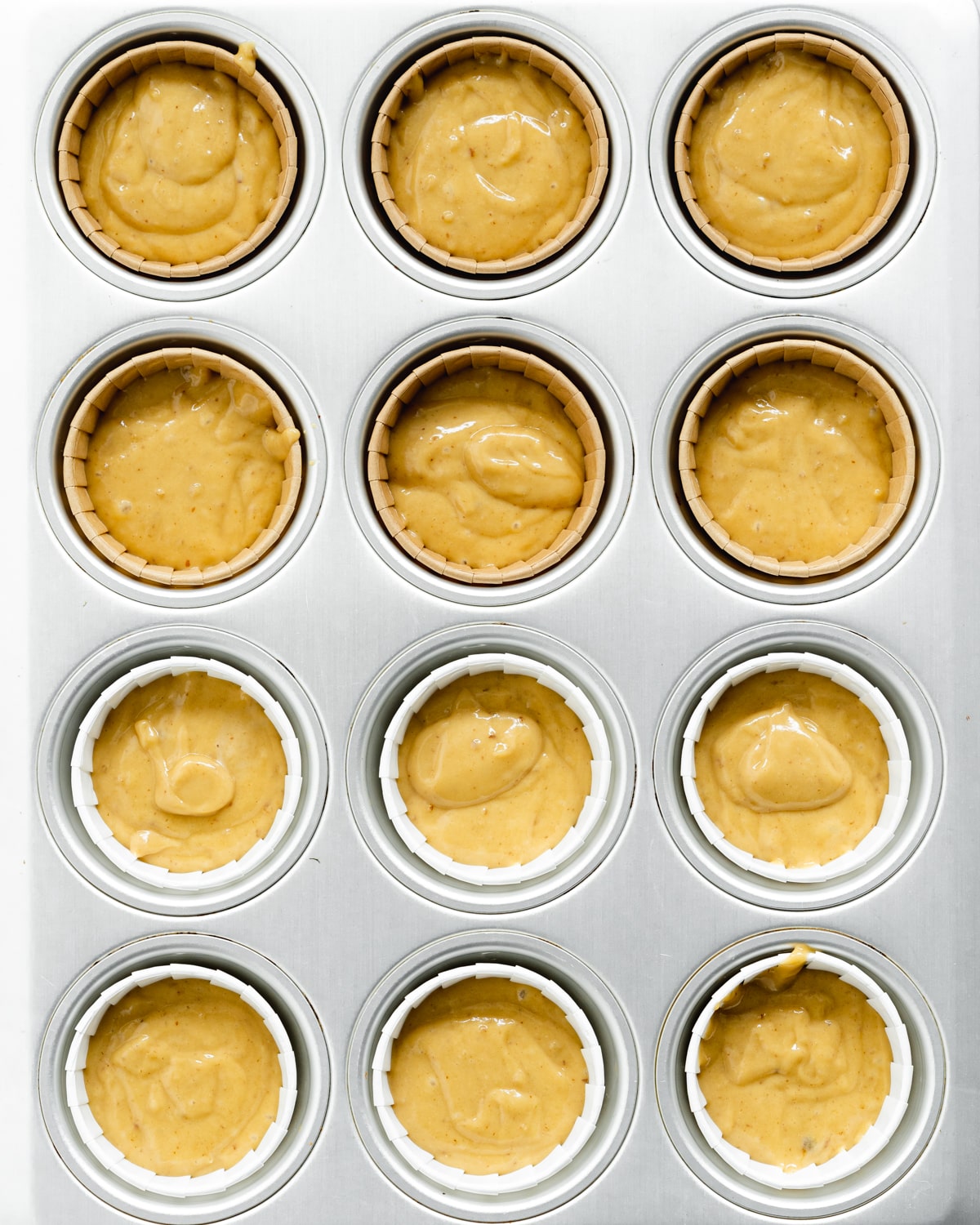 cupcake tray filled with batter.