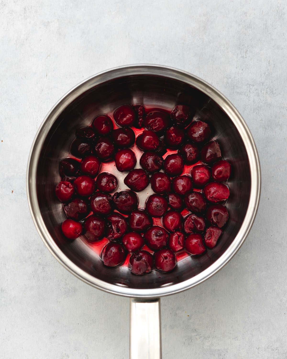 cherries in a saucepan.