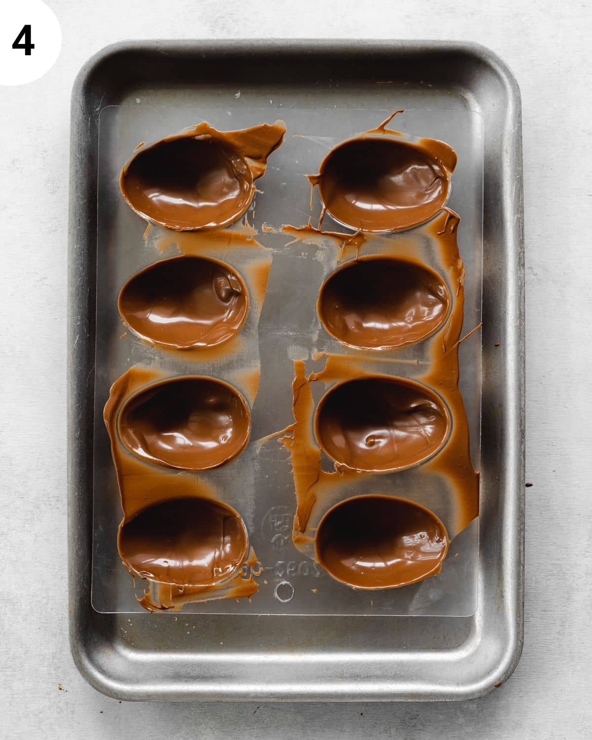 chocolate eggs in an egg mold.