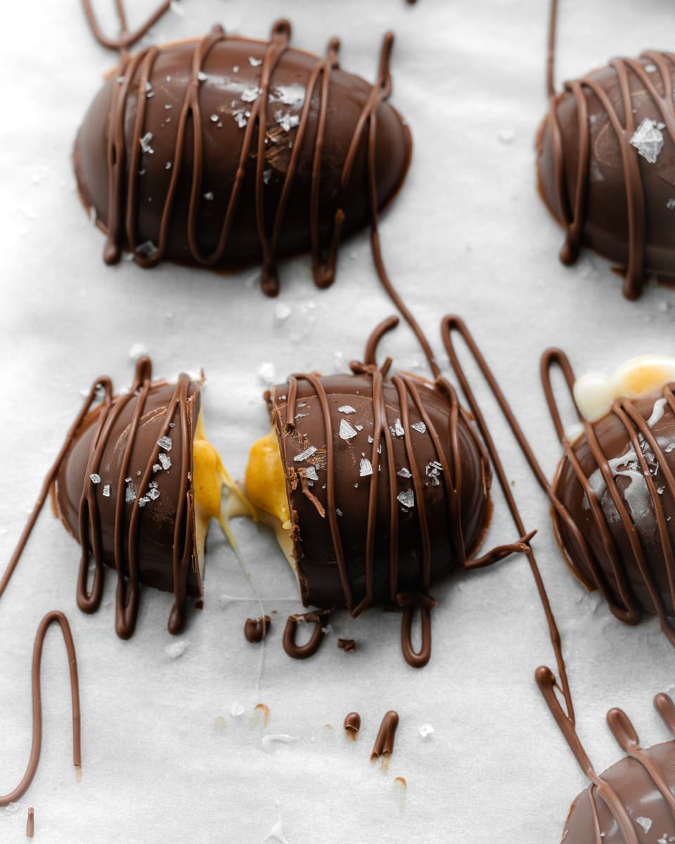 homemade cadburys creme eggs drizzled with chocolate.