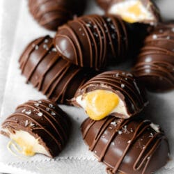 homemade cadburys creme eggs on a metal tray.