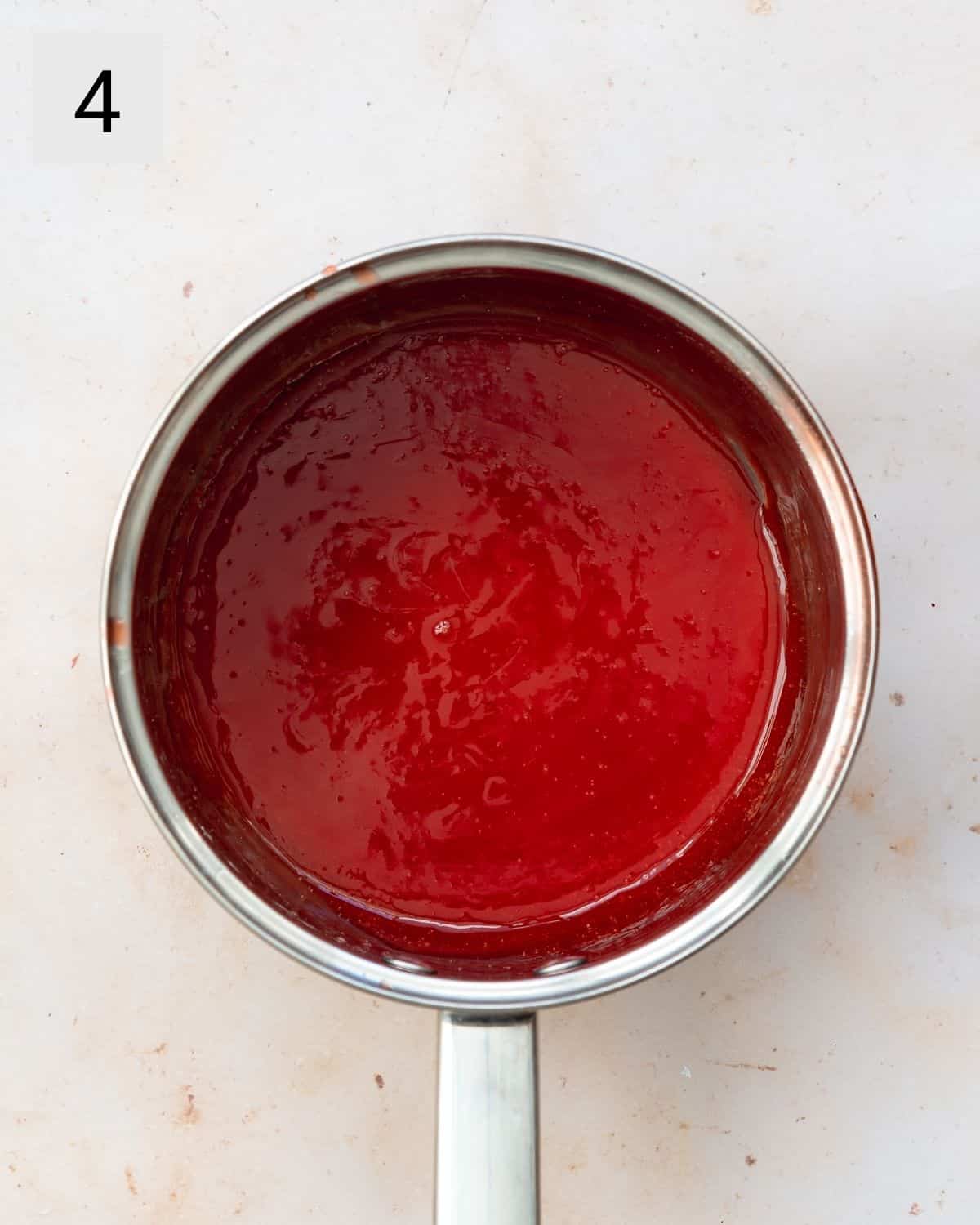 strawberry sauce in a saucepan.