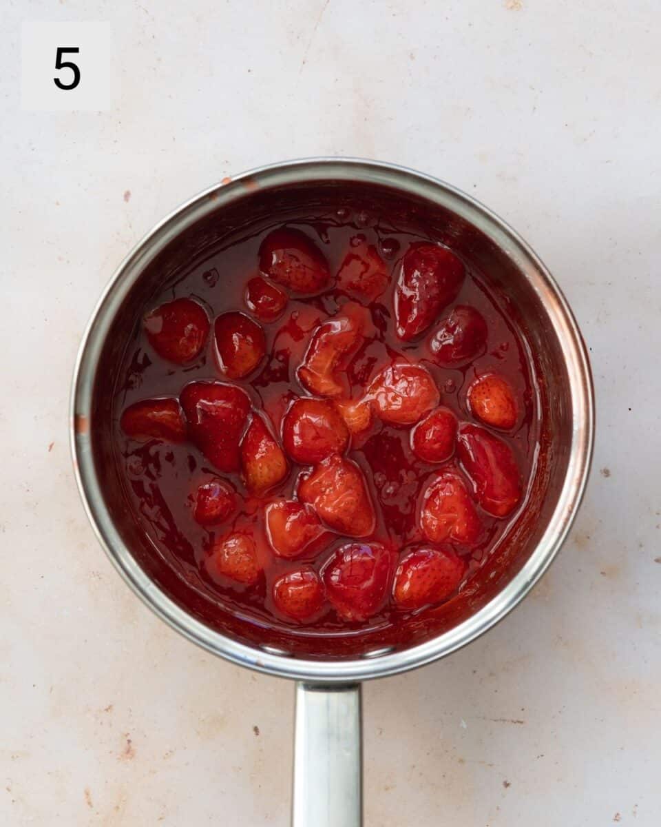 strawberry confit in a saucepan.