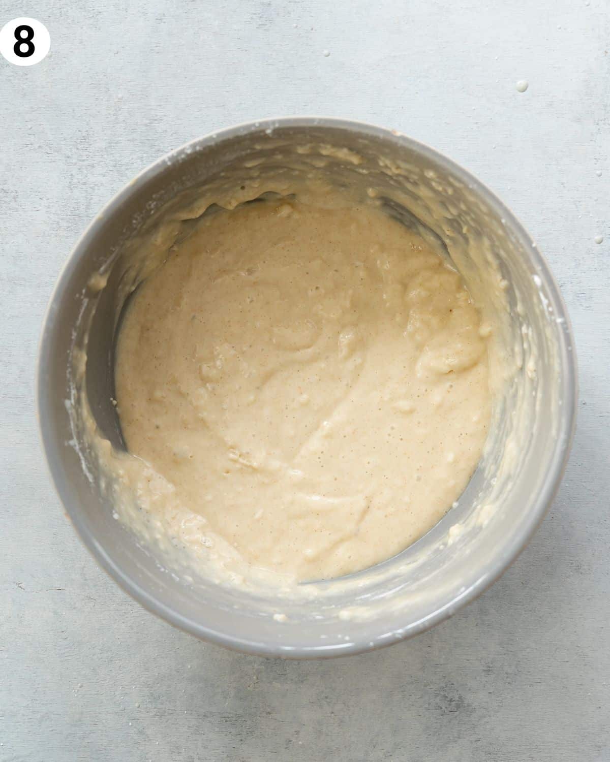 batter for tres leches in a grey bowl.