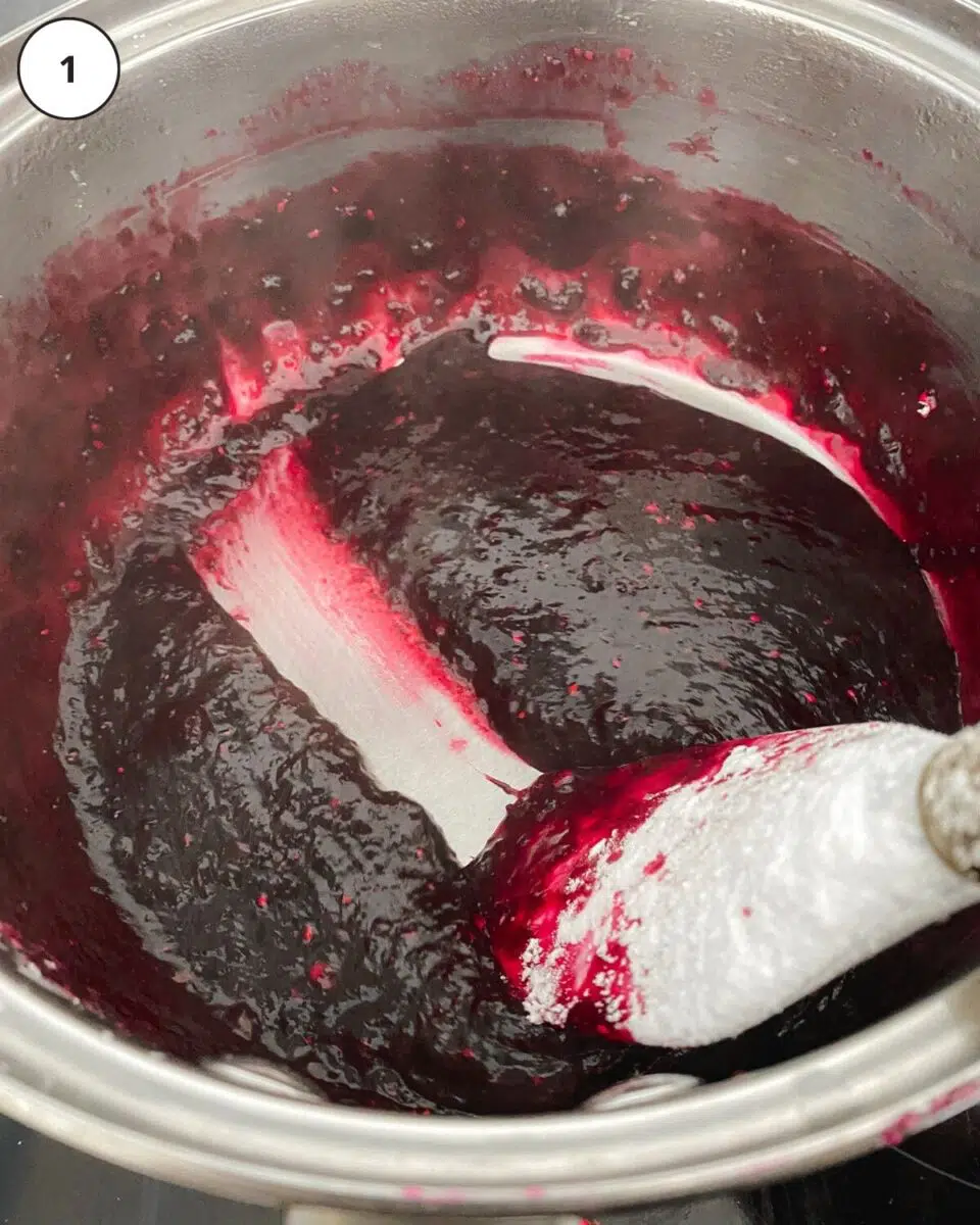 close up of blueberry jam in a saucepan.