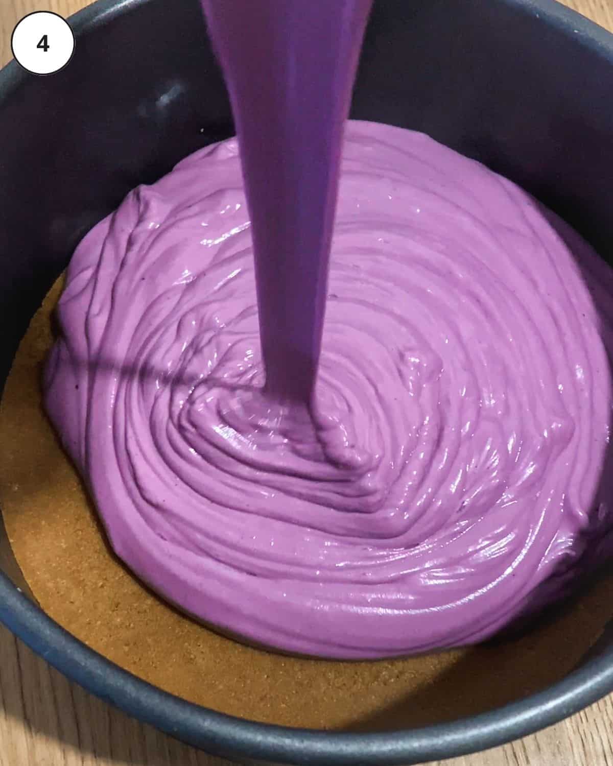 top down view of blueberry cheesecake mixture in a blender.