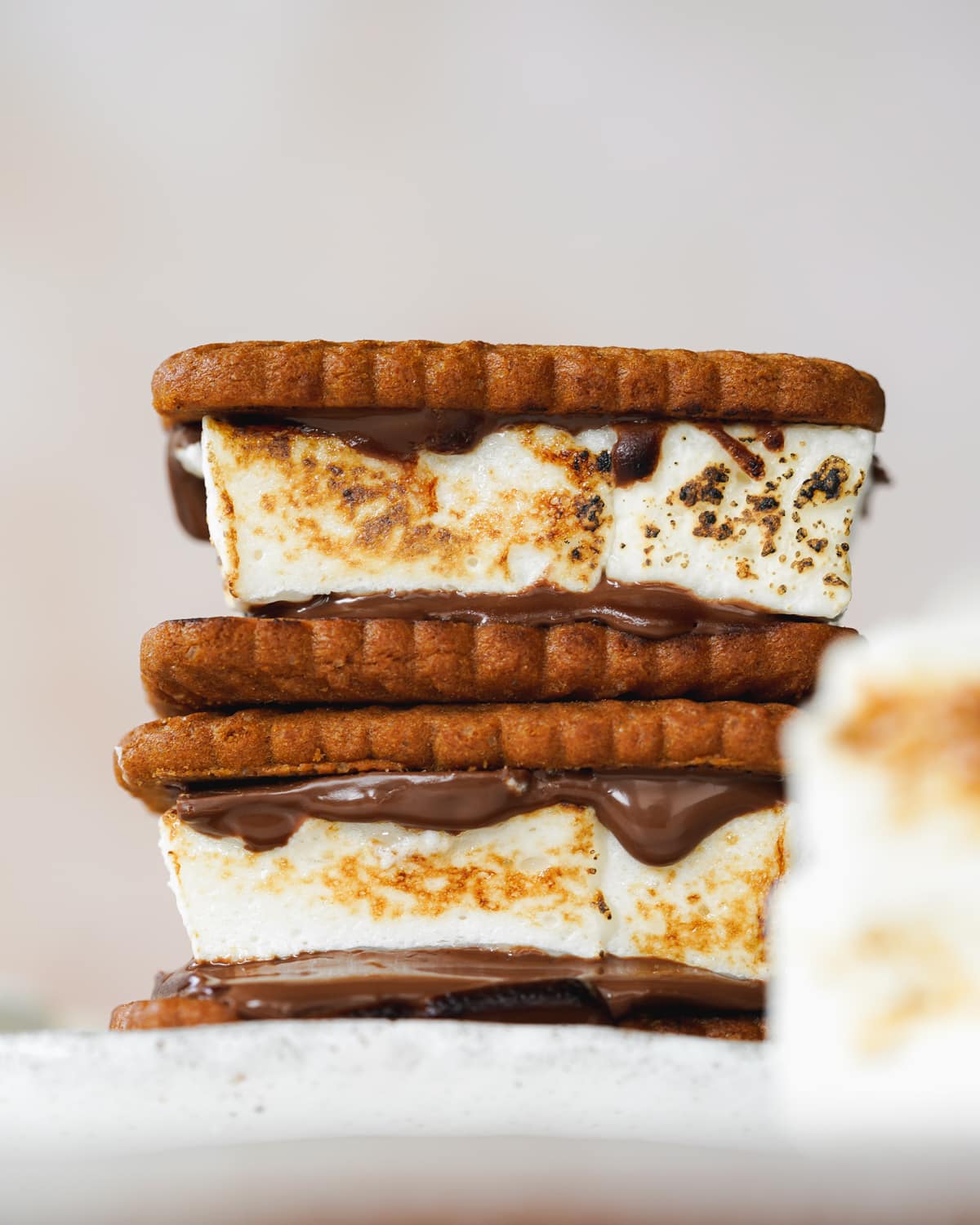 stack of vegan s'mores with toasted marshmallows.