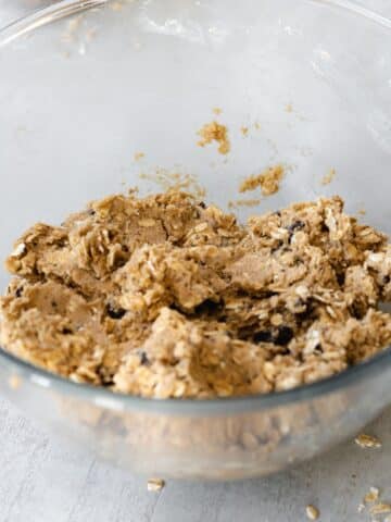 oatmeal raisin cookie dough in a mixing bowl.