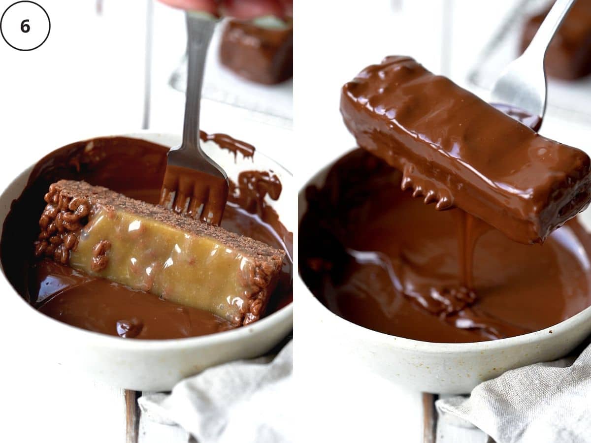 dunking homemade toffee crisp bars into a bowl with melted chocolate.