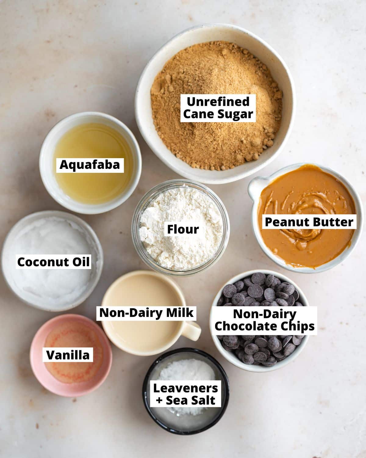 ingredients to make peanut butter blondies measured out in bowls.