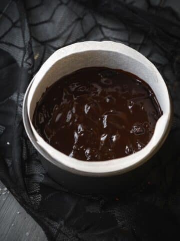 chocolate biscuit cake in a cake mould before going into the fridge to set.