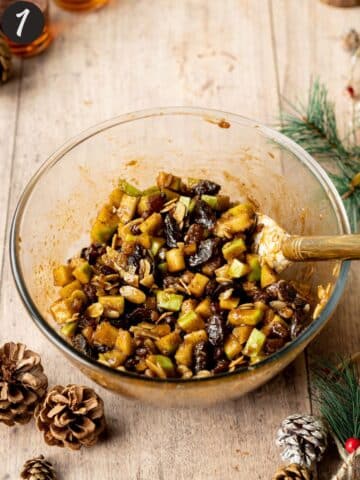homemade mincemeat filling for mince pies in a clear bowl.