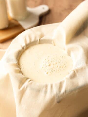 homemade mascarpone in a cheesecloth.
