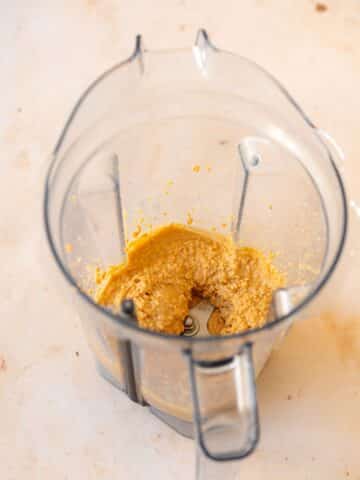 peanuts blender to a coarse thick consistency in a blender jug.