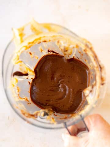 Overhead shot of completed DIY chocolate peanut butter in the blender after mixing.