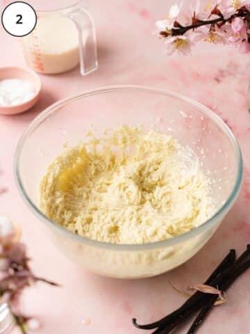 butter and sugar creamed in a mixing bowl for vegan vanilla cake.