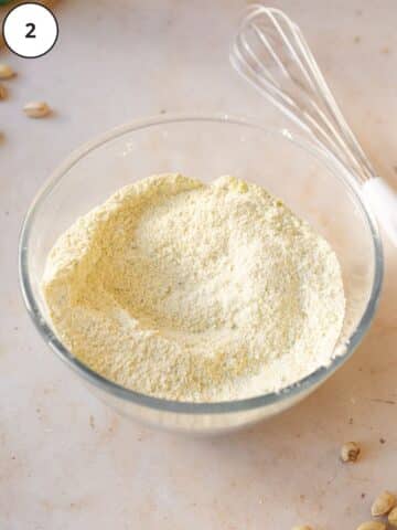 dry ingredients for pistachio cake whisked together in a large mixing bowl.