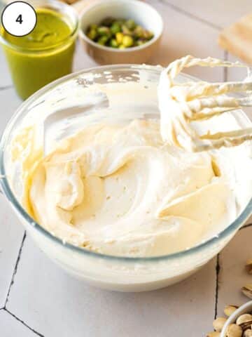 whipped dairy-free mascarpone and sabayon in a large clear mixing bowl.