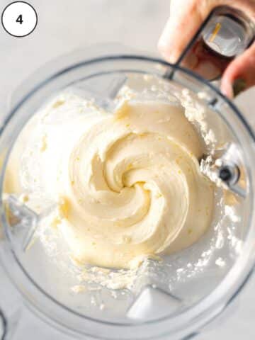 Lemon cream cheese filling after blitzing in a food processor until the texture of marshmallow fluff.