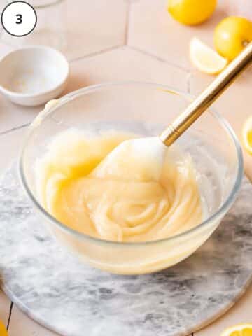 vegan lemon custard cooling in a mixing bowl before being whisked into dairy-free buttercream.