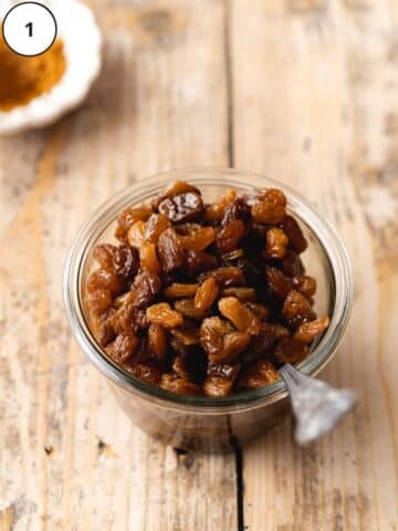 Soaking raisins in rum.