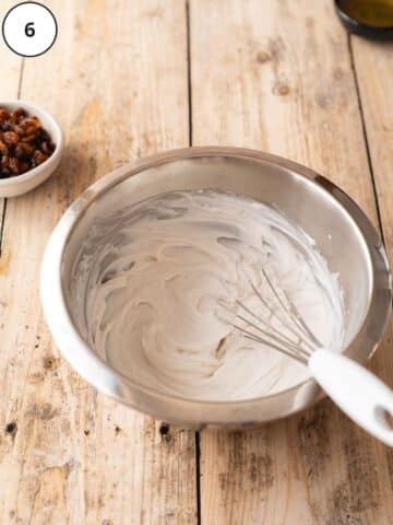 Coconut cream whisked until light and fluffy in a mixing bowl.