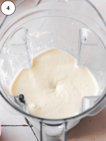 vegan lemon cheesecake filling in a vitamix blender jug.