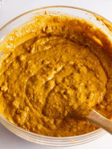carrot loaf cake batter in a bowl.