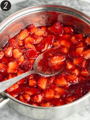 macerated strawberries and their juice in a saucepan.