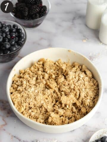 crumble topping for berry crisp in a bowl before chilling in the fridge.