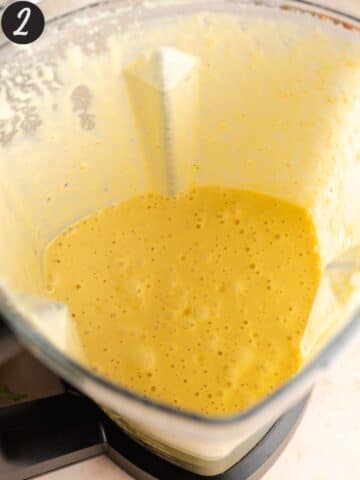 peaches, yogurt, milk, apple cider vinegar, olive oil, and vanilla extract blended until smooth in a blender jug.