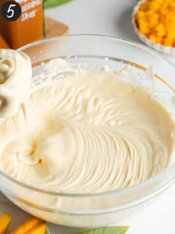 vegan cream cheese, yogurt, and vanilla whisked in a large mixing bowl.