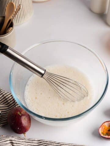 cornstarch and non-dairy milk whisked in a bowl.