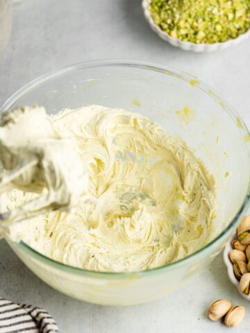 whipped pistachio ganache in a mixing bowl.