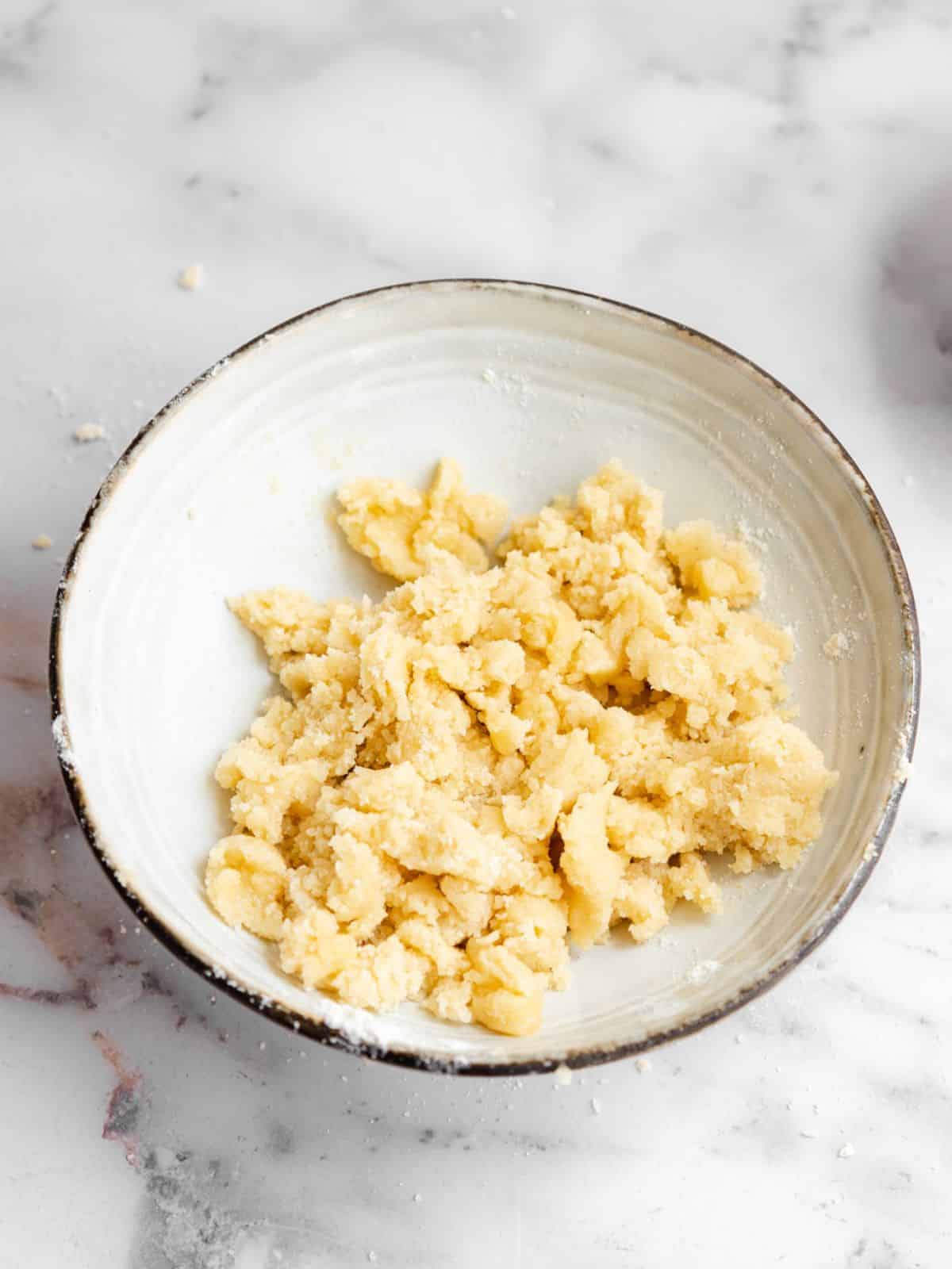 shortcake crumble topping in a small bowl.