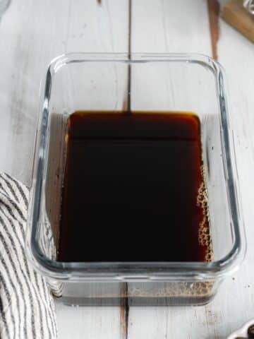 espresso and hazelnut liqueur in a shallow glass container.