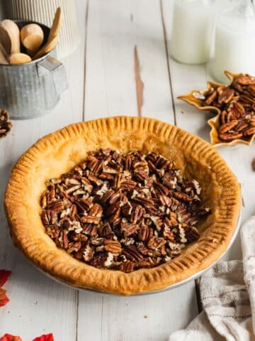 pastry crust with chopped pecans in the base before adding the caramel.