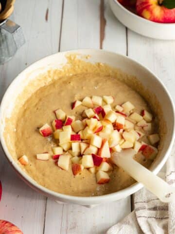 muffin batter with fresh apple chunks tossed in.